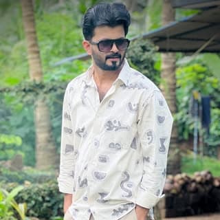 Ali Mangad Singer