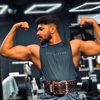 Adhil S