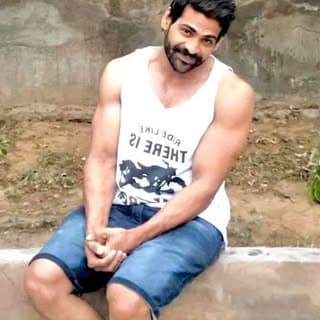 TAHIR KHAN