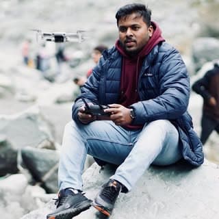 K Naveen John