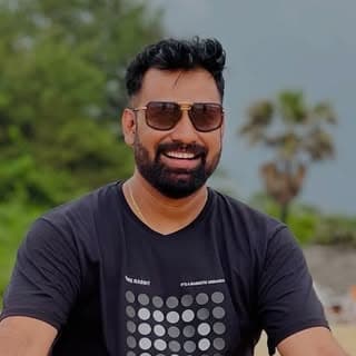 Prasad P K