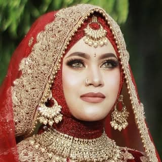 Hj. Zakiah Abduh