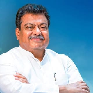 M B Patil