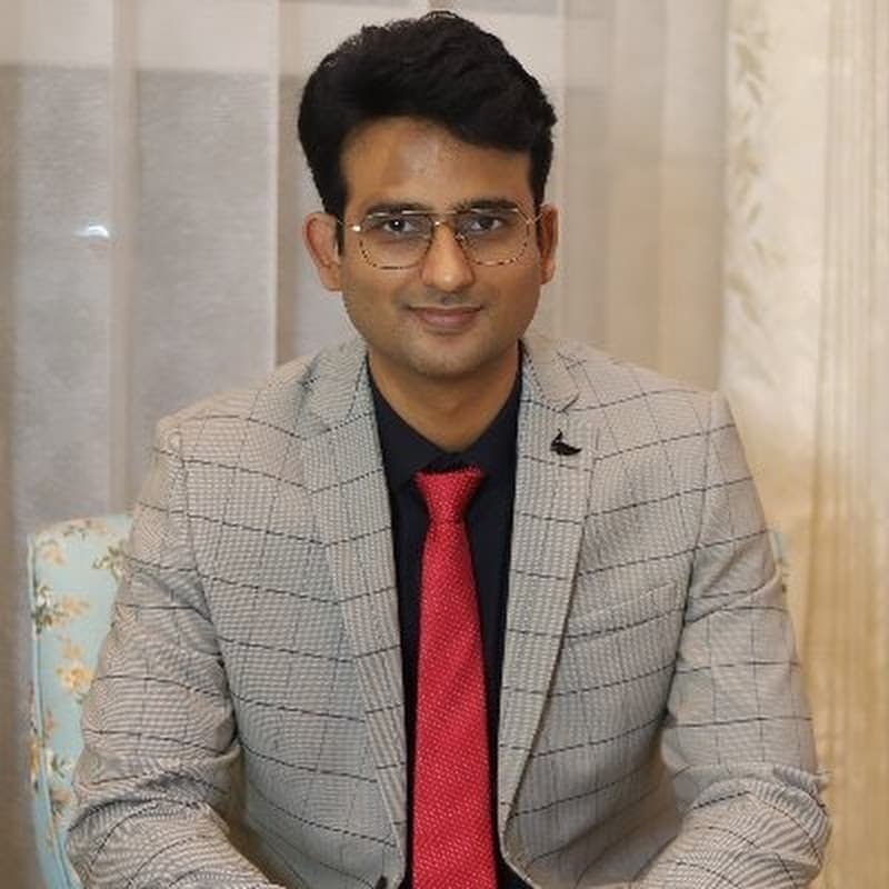 Dr Praveen Tripathi