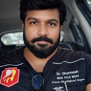 Dr Dharmesh | Dental & Hair Care Specialist