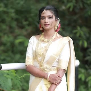 Dhanya M?